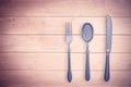 Composite image of silver knife, fork and spoon Royalty Free Stock Photo