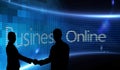 Composite image of smiling business people shaking hands while looking at the camera Royalty Free Stock Photo
