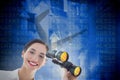 Composite image of smiling business woman with binoculars Royalty Free Stock Photo