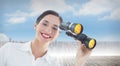 Composite image of smiling business woman with binoculars Royalty Free Stock Photo