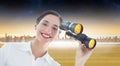 Composite image of smiling business woman with binoculars Royalty Free Stock Photo