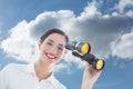 Composite image of smiling business woman with binoculars Royalty Free Stock Photo