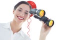 Composite image of smiling business woman with binoculars Royalty Free Stock Photo