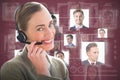 Composite image of smiling businesswoman with headset using computers Royalty Free Stock Photo