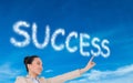 Composite image of smiling businesswoman pointing Royalty Free Stock Photo