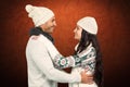 Composite image of smiling couple hugging and looking at each other Royalty Free Stock Photo