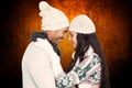 Composite image of smiling couple hugging and looking at each other Royalty Free Stock Photo