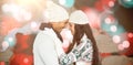 Composite image of smiling couple hugging and looking at each other Royalty Free Stock Photo