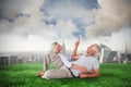 Composite image of smiling couple lying and looking up Royalty Free Stock Photo