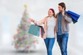 Composite image of smiling couple walking hand in hand and going window shopping Royalty Free Stock Photo