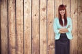Composite image of smiling hipster woman with arms crossed Royalty Free Stock Photo
