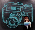 Composite image of smiling hipster woman using her tablet Royalty Free Stock Photo