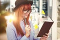 Composite image of smiling hipster woman writing notes Royalty Free Stock Photo