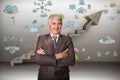 Composite image of smiling male manager with arms crossed Royalty Free Stock Photo