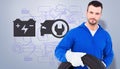 Composite image of smiling male mechanic holding tire Royalty Free Stock Photo