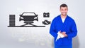 Composite image of smiling mechanic wiping hands with cloth Royalty Free Stock Photo
