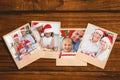 Composite image of smiling old couple swapping christmas gifts Royalty Free Stock Photo