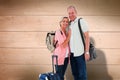 Composite image of smiling older couple going on their holidays Royalty Free Stock Photo