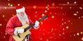 Composite image of smiling santa claus playing guitar Royalty Free Stock Photo