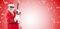 Composite image of smiling santa claus playing a guitar Royalty Free Stock Photo