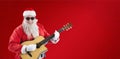 Composite image of smiling santa claus playing guitar while standing Royalty Free Stock Photo