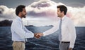 Composite image of smiling young businessmen shaking hands in office Royalty Free Stock Photo