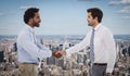 Composite image of smiling young businessmen shaking hands in office Royalty Free Stock Photo