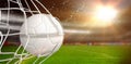 Composite image of soccer ball in goal net Royalty Free Stock Photo