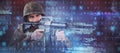 Composite image of soldier aiming with rifle Royalty Free Stock Photo
