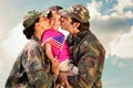 Composite image of soliders reunited with children Royalty Free Stock Photo