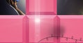 Composite image of spot of light over pink 3d banner against copy space on grey background Royalty Free Stock Photo