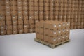 Composite image of stack of cardboard boxes on white background Royalty Free Stock Photo