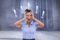 Composite image of stressed businessswoman with hand on her head