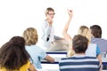 Composite image of student raising hand in classroom Royalty Free Stock Photo