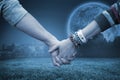 Composite image of students holding hands Royalty Free Stock Photo