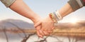 Composite image of students holding hands Royalty Free Stock Photo