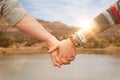 Composite image of students holding hands Royalty Free Stock Photo