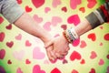 Composite image of students holding hands Royalty Free Stock Photo