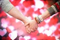 Composite image of students holding hands Royalty Free Stock Photo