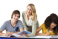 Composite image of teacher helping student in class Royalty Free Stock Photo