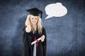 Composite image of teenage girl celebrating graduation with thumbs up Royalty Free Stock Photo