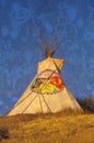 Composite image of a teepee silhouetted at dusk and Indian petroglyphs in the sky Royalty Free Stock Photo