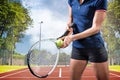 Composite image of tennis player holding a racquet ready to serve Royalty Free Stock Photo