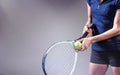 Composite image of tennis player holding a racquet ready to serve Royalty Free Stock Photo