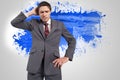 Composite image of thinking businessman scratching head Royalty Free Stock Photo