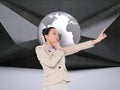 Composite image of thoughtful businesswoman pointing Royalty Free Stock Photo