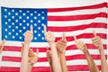 Composite image of thumbs raised and hands up Royalty Free Stock Photo