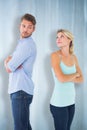 Composite image of unhappy couple not speaking to each other Royalty Free Stock Photo