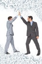 Composite image of unified business team high fiving each other Royalty Free Stock Photo