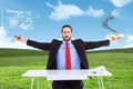 Composite image of unsmiling businessman sitting with arms outstretched Royalty Free Stock Photo